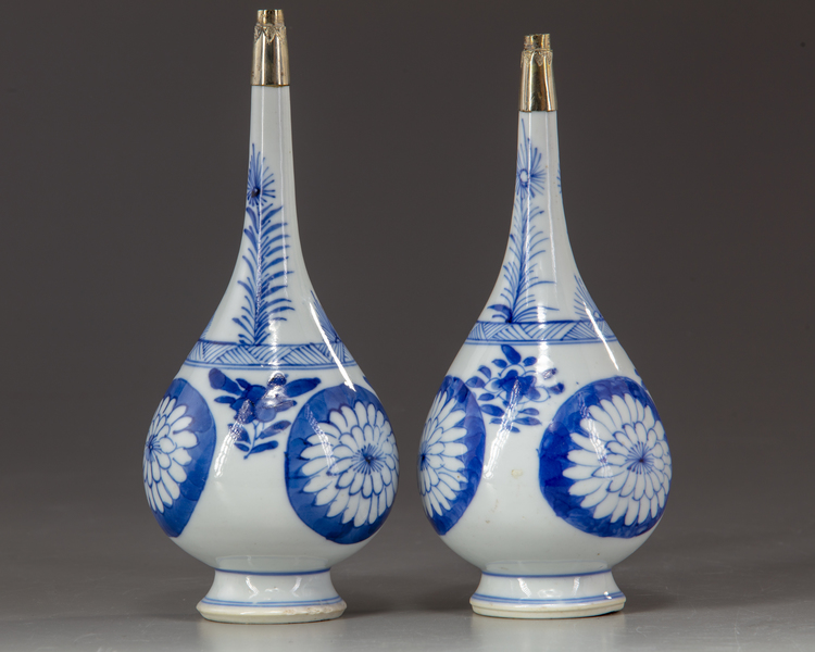 A pair of blue and white rosewater sprinklers