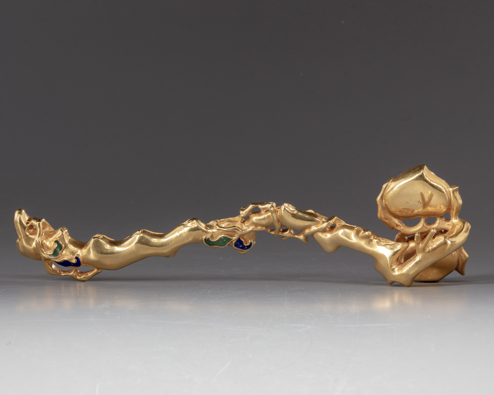 A Chinese gilt bronze ruyi-sceptre