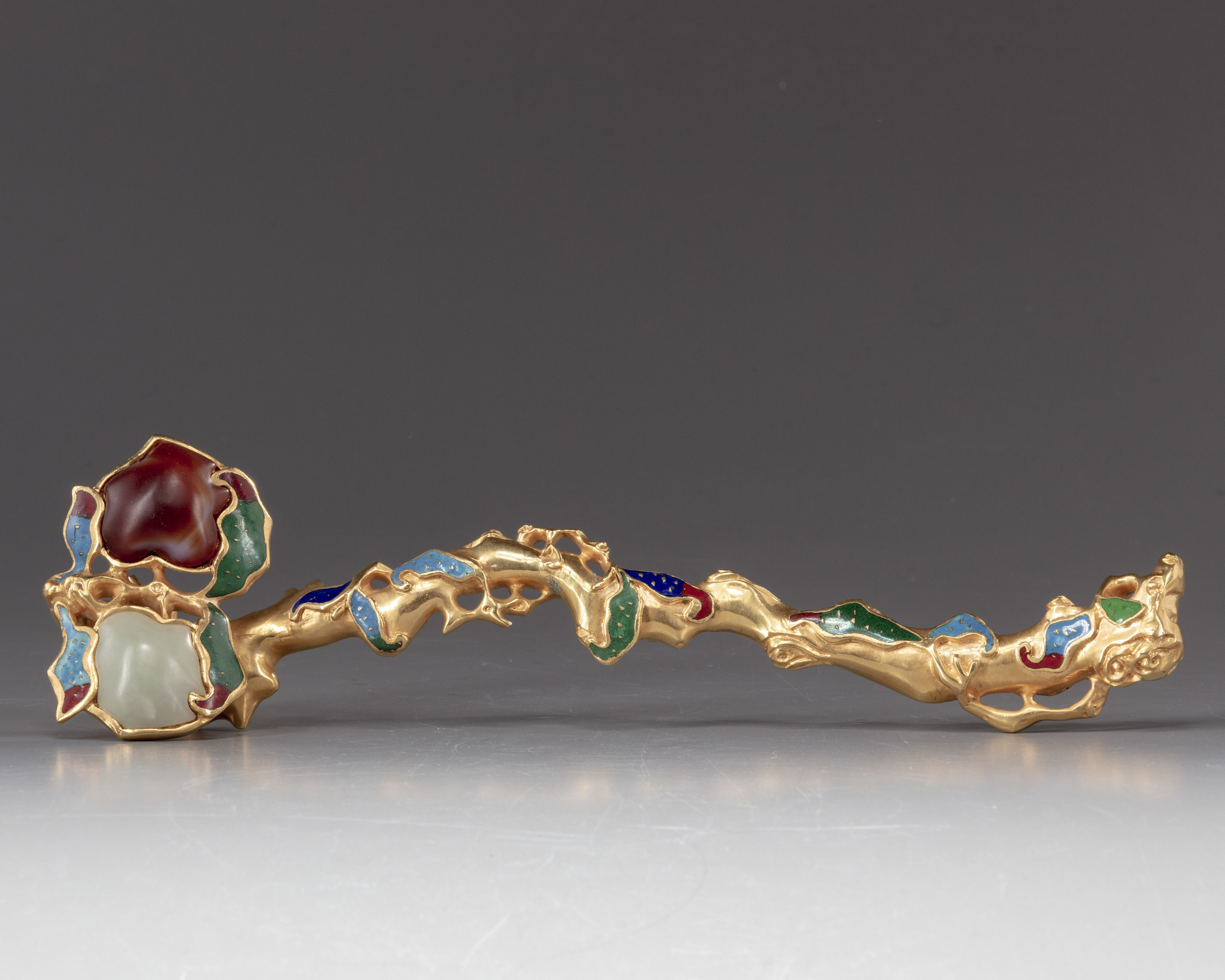 A Chinese gilt bronze ruyi-sceptre