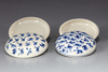 Two Chinese blue and white boys boxes and covers