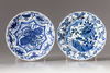 Two blue and white saucers