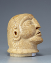 A Bactrian marble urn lid ststue