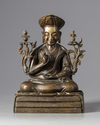 A partial gilt Chinese bronze buddha figure