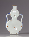 A Chinese blue and white double gourd wall vase