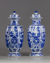 Two blue and white vases with cover