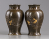 A pair of Japanese bronze vases