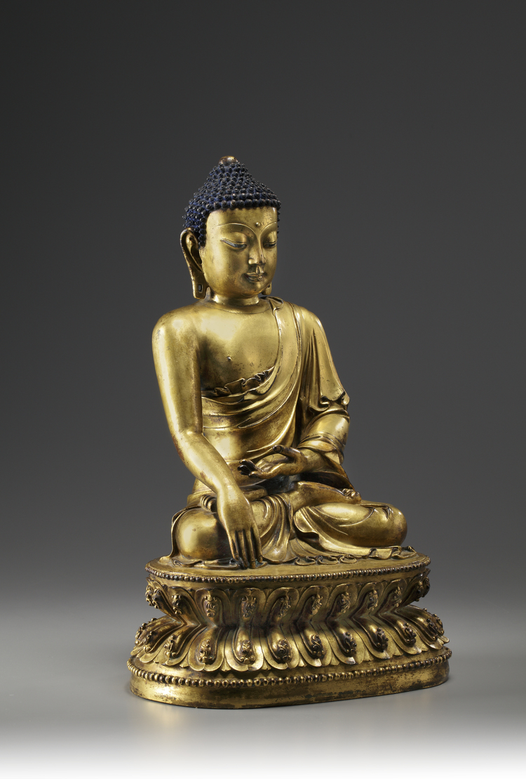 A Chinese gilt bronze figure of Buddha Shakyamuni.