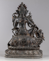 A partial gilt and lacquered figure of guanyin on a mythical beast