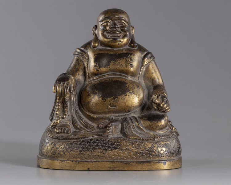 A gilt bronze figure of budai