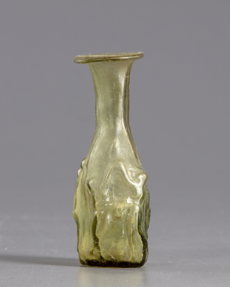 A ROMAN GLASS FLASK, CIRCA 3RD CENTURY AD