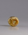 A ROMAN HEAD GLASS FLASK, CIRCA 3RD CENTURY AD