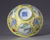 A Chinese famille rose yellow-ground sgraffiato 'Three Rams' medallion bowl
