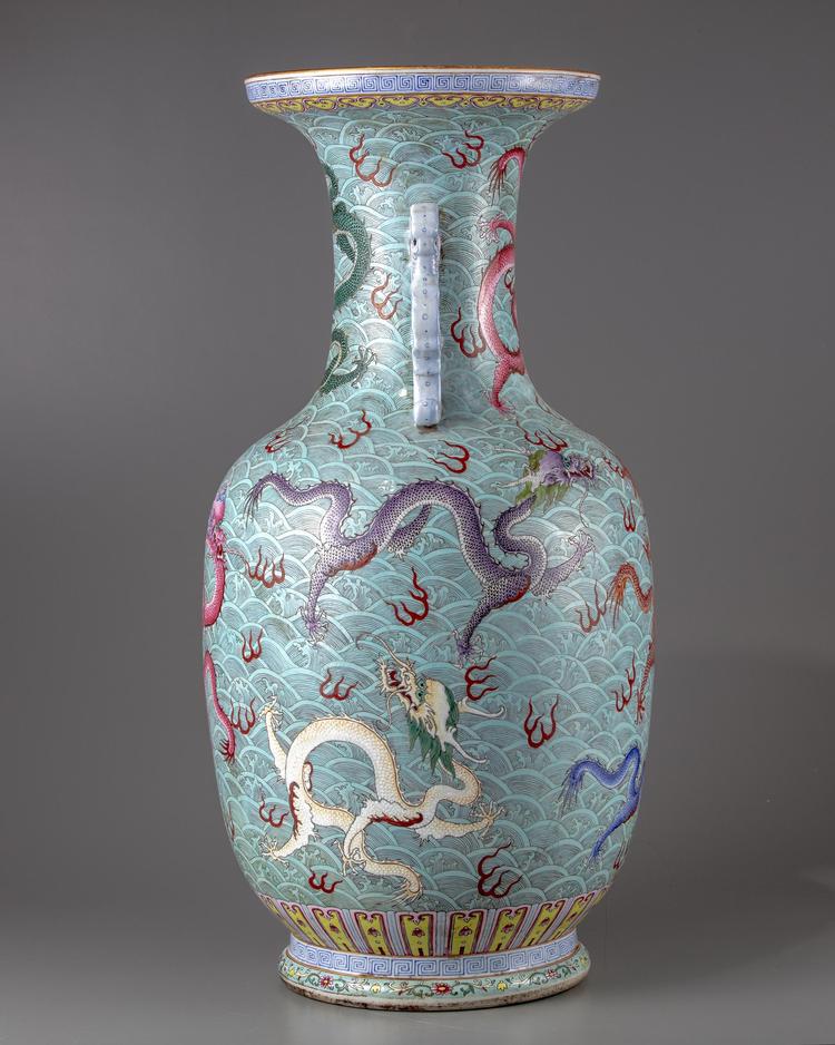 A CHINESE BLUE-GROUND FAMILLE ROSE 'DRAGONS' VASE