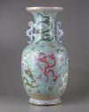 A CHINESE BLUE-GROUND FAMILLE ROSE 'DRAGONS' VASE
