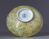 A large Chinese yellow-ground green decorated 'dragon' bowl