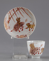 A gilt Chinese cup and saucer