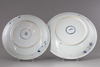 TWO CHINESE BLUE AND WHITE BLUE AND WHITE CHARGERS, KANGXI PERIOD AND 18TH CENTURY