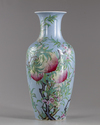 A Chinese blue-ground famille rose 'peaches' vase
