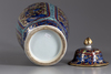 A later-enamelled Chinese blue and white vase and cover