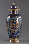 A later-enamelled Chinese blue and white vase and cover