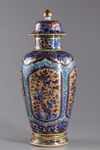 A later-enamelled Chinese blue and white vase and cover