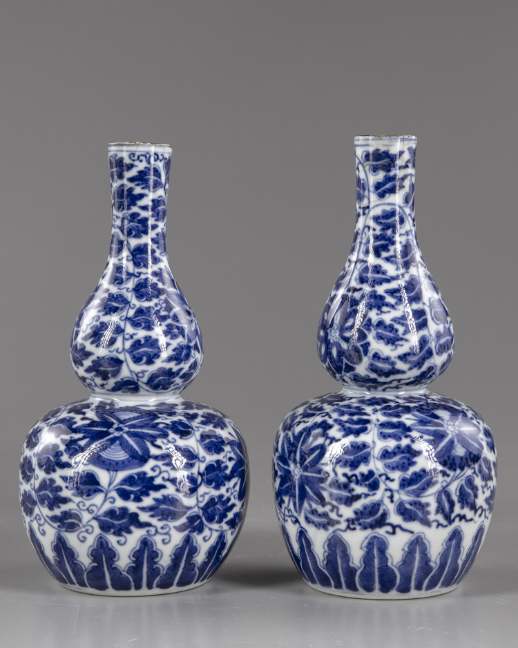 TWO CHINESE BLUE AND WHITE DOUBLE-GOURD VASES