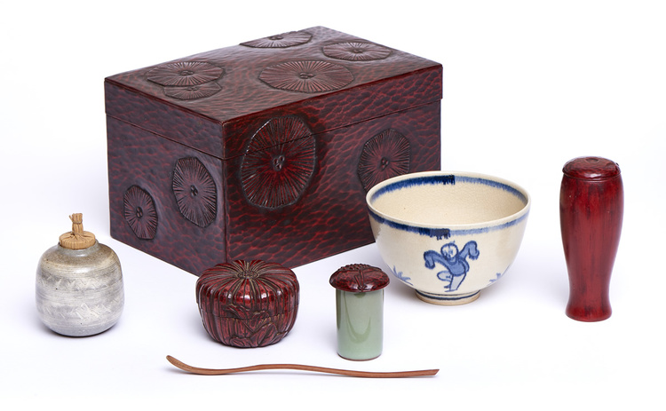 A Japanese rectangular kamakurabori lacquerware box with a tea-set in the style of tea-master Sen no Rikyū (Rikyū chabako)