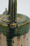 A Japanese oribe-ware cylindrical teapot with handle