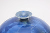 A Japanese globular vase with a narrow mouth decorated with metallic clear blue patches