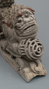A rare set of two plain wooden corbels from Kyūshū with carved Chinese lions (karashishi)