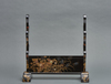 A Japanese black lacquered sword stand (katanakake) for five swords