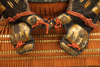 A large gilded Japanese ōyoroi with orange cords (hi’ito odoshi yoroi). A large hoshikabuto-helmet with gilded parts, large fukikaeshi