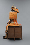 A large gilded Japanese ōyoroi with orange cords (hi’ito odoshi yoroi). A large hoshikabuto-helmet with gilded parts, large fukikaeshi