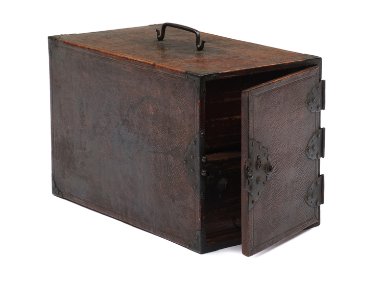 A rare Japanese rectangular portable wooden box with four drawers of various size behind a door