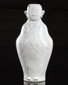 An unusual Chinese white-glazed antropomorphic vase