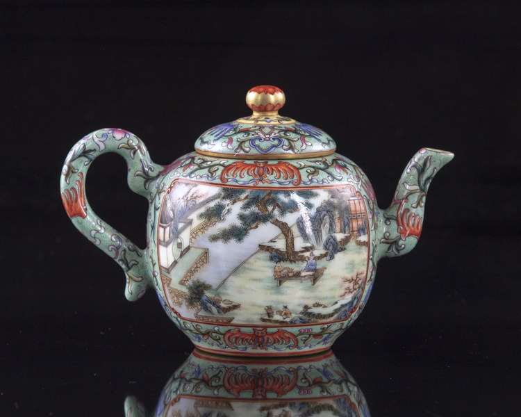 A Chinese green-ground famille rose 'Hui Mountain Retreat' teapot and cover