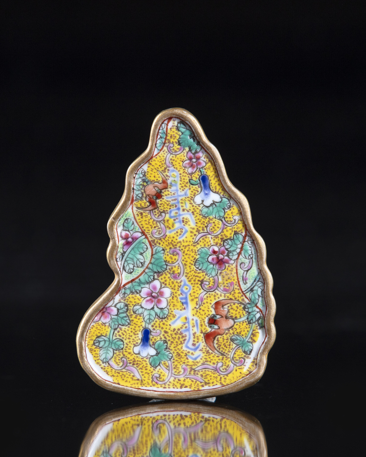 A CHINESE FAMILLE ROSE 'ABSTINENCE' PLAQUE