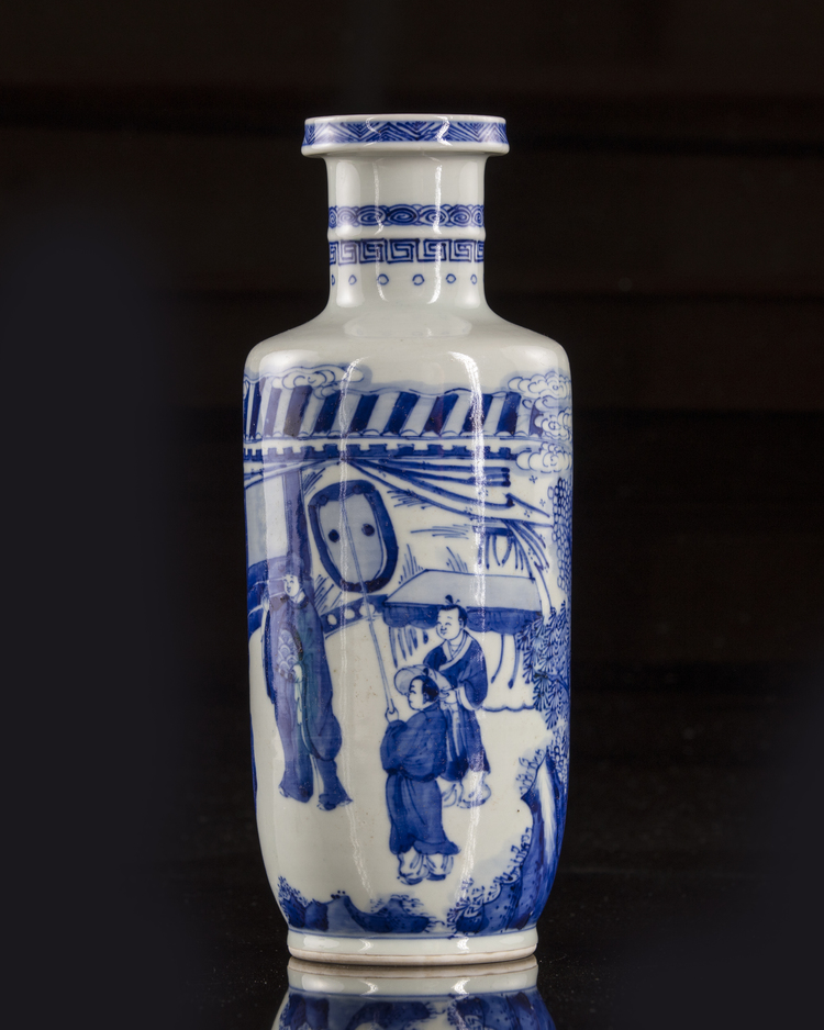A small Chinese blue and white 'figural' rouleau vase