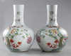 A PAIR OF LARGE CHINESE FAMILLE ROSE 'BIRDS AND FLOWERS' BOTTLE VASES, TIANQIUPING, 19TH-20TH CENTURY