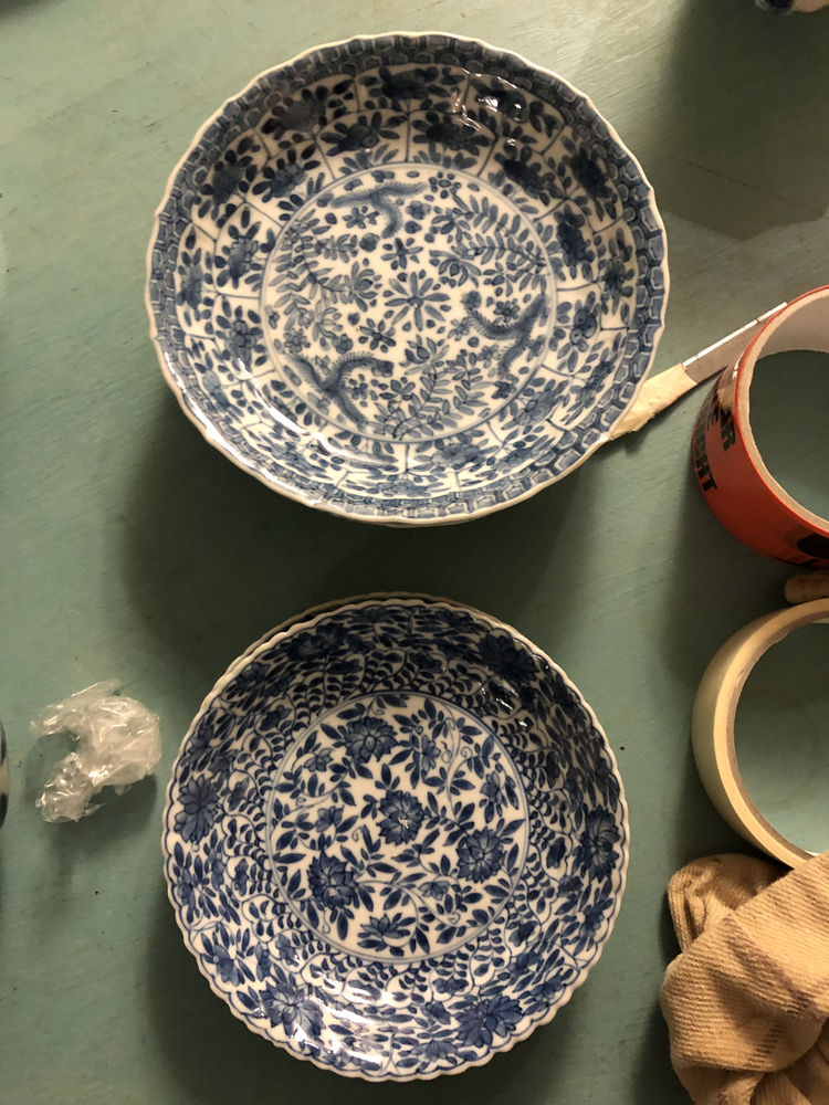 Six blue and white saucers