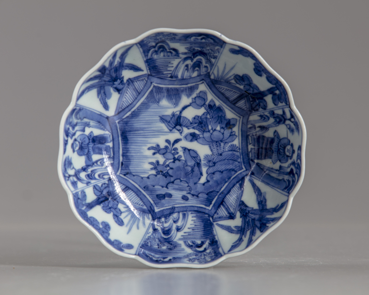 A JAPANESE BLUE AND WHITE LOBED DISH