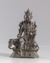 A Chinese bronze Guanyin figure