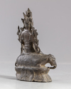 A Chinese bronze Guanyin figure