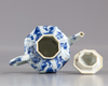 A SMALL CHINESE BLUE AND WHITE TEAPOT