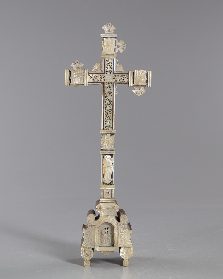A large mother of pearl cross