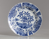 A CHINESE BLUE AND WHITE SCALLOPED DISH, 19TH CENTURY
