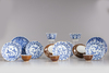 A lot of Chinese blue and white cups and saucers