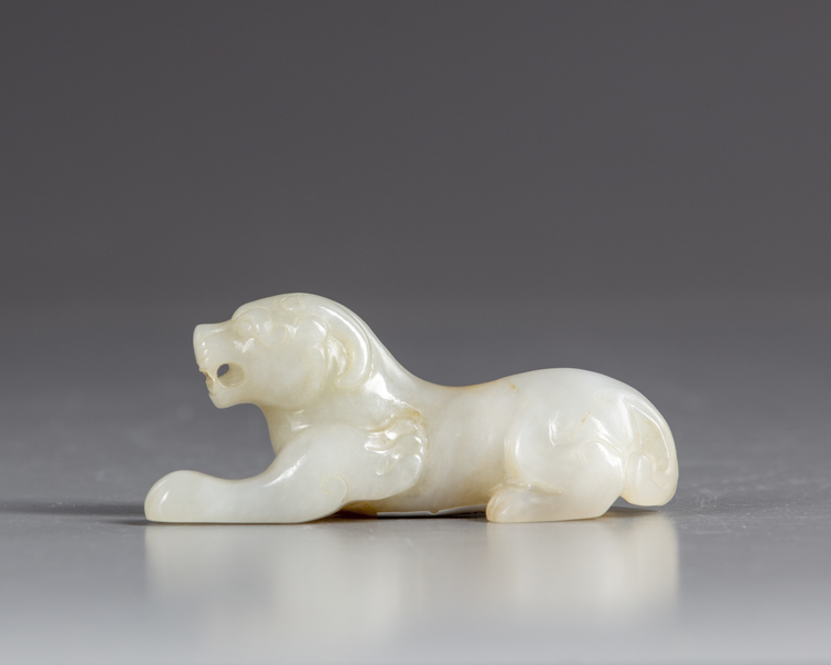 A Chinese jade tiger carving