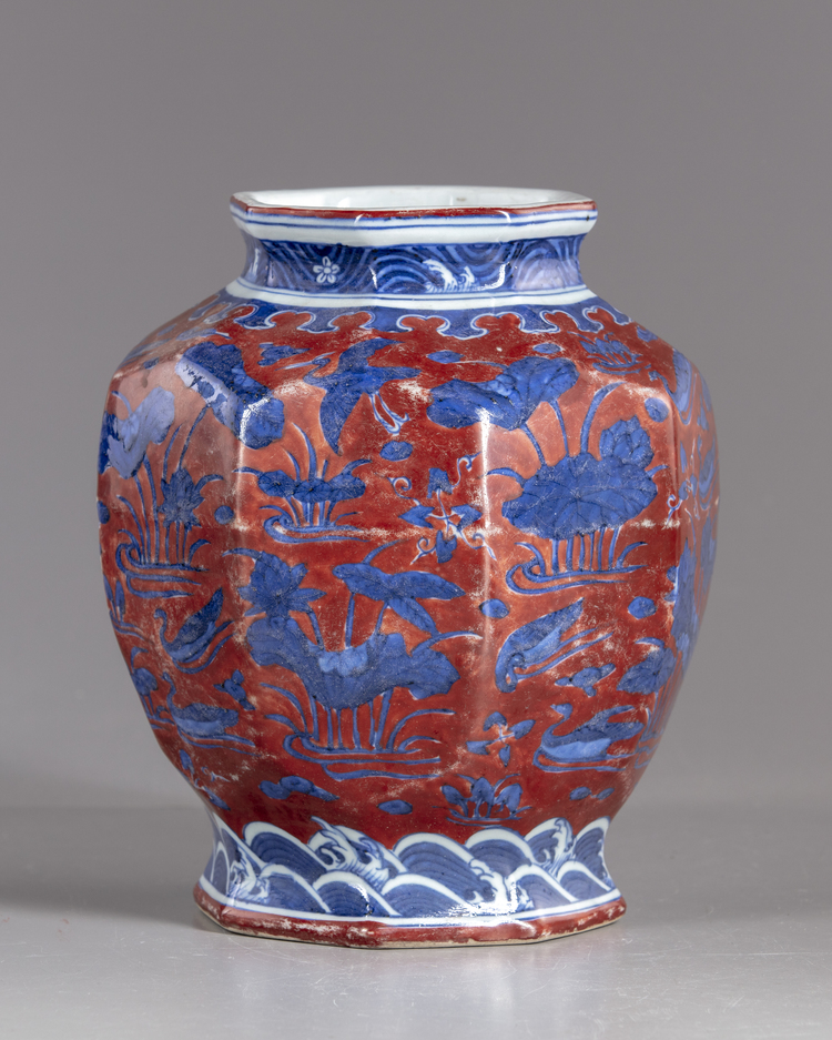 A Chinese octagonal deep red and blue jar