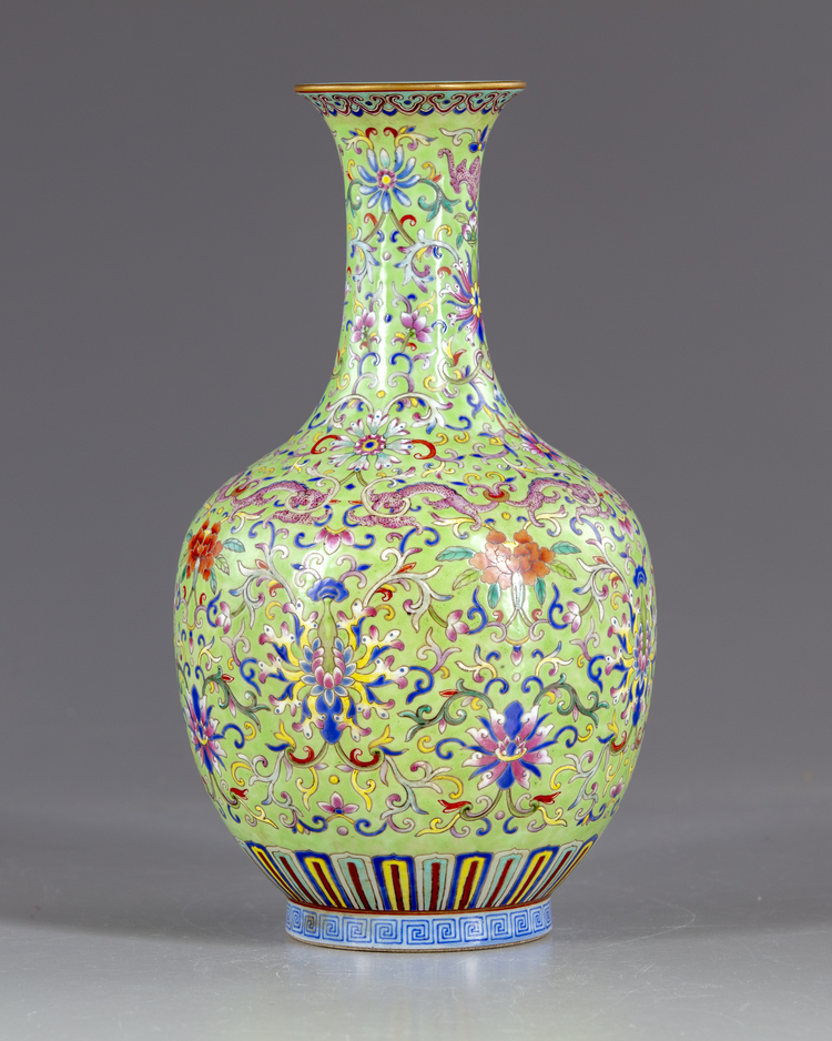 A Chinese famille rose lime green vase